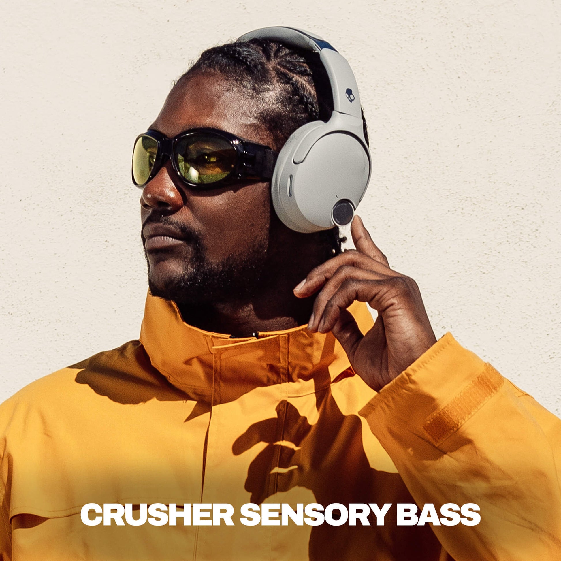 Man wearing Crusher 1080 and sunglasses with a text overlay on a plain background | Cement