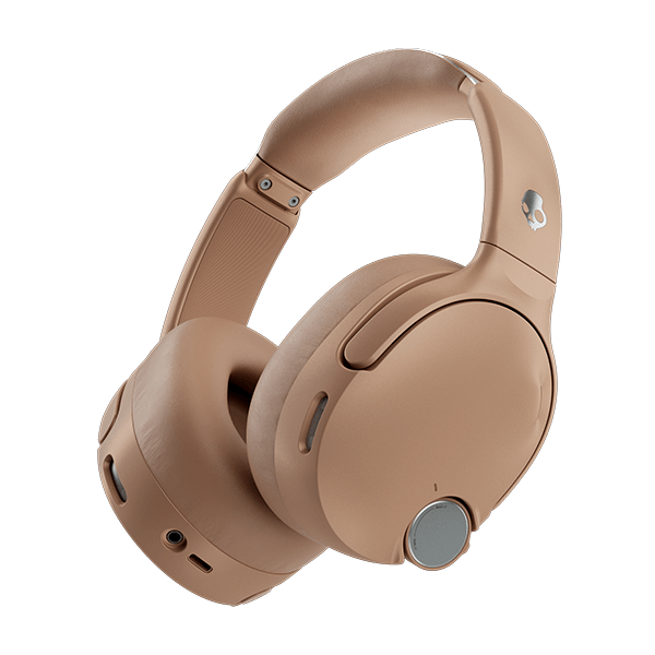 Beige skullcandy crusher 1080 headphones on a black background | Primer