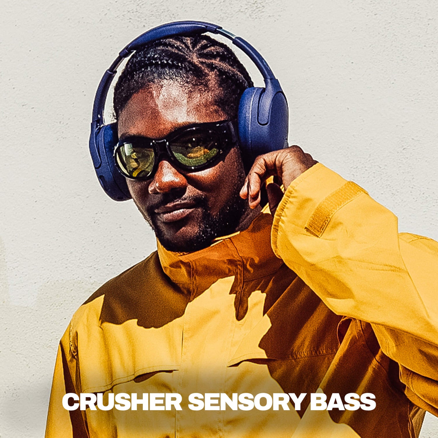 Man wearing purple Crusher 720 and yellow jacket with 'Crusher Sensory Bass' text. | Future