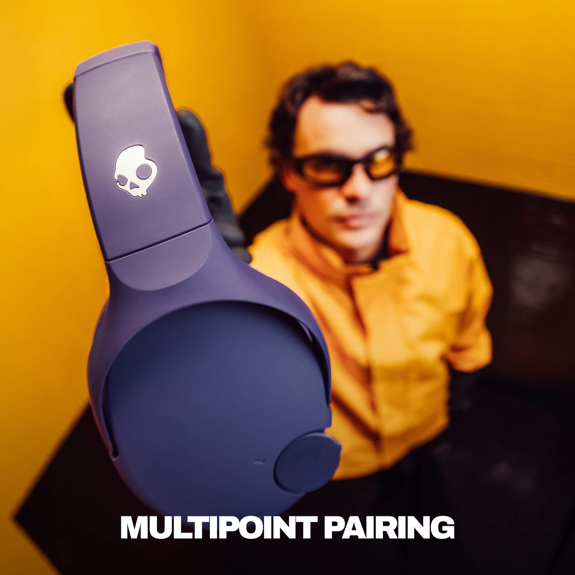 Purple Bluetooth Crusher 720 with skull logo on a yellow background, featuring text 'MULTIPOINT PAIRING'. | Future
