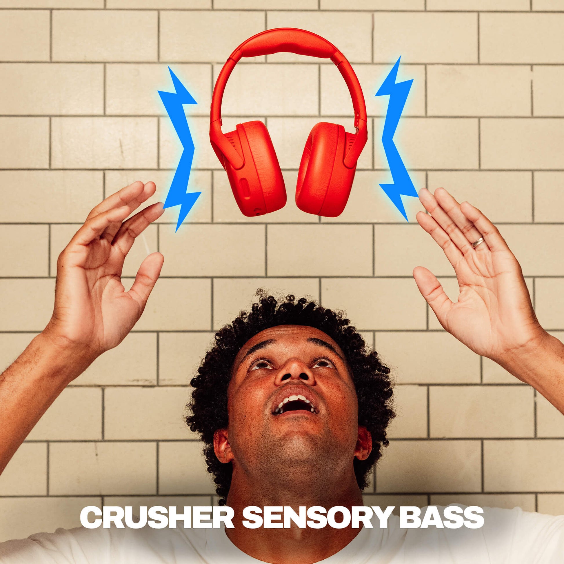 Person with red Crusher 720 and blue lightning bolts against a tiled wall, with 'Crusher Sensory Bass' text. | Plasma
