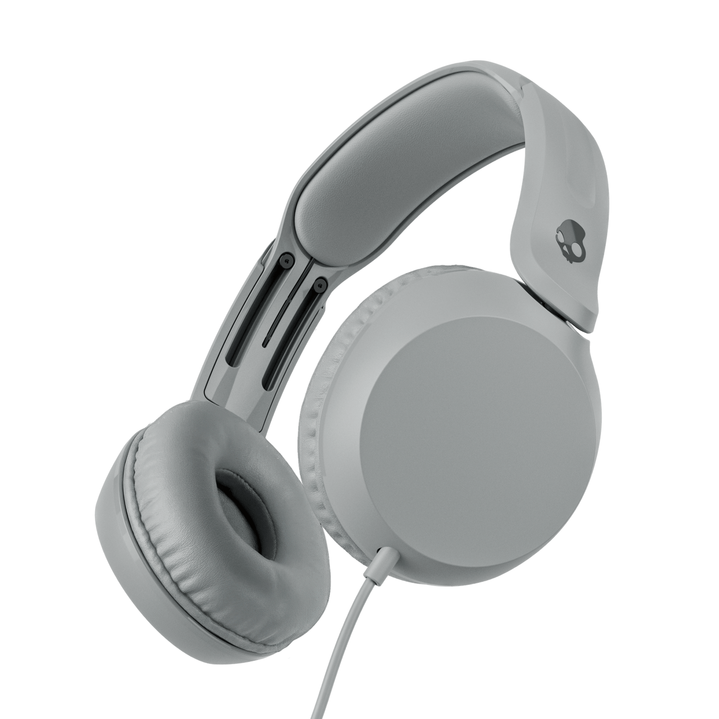 White over-ear wired headphones shown at an angle against a solid black background. | Cement