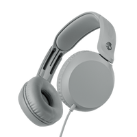 White over-ear wired headphones shown at an angle against a solid black background. | Cement