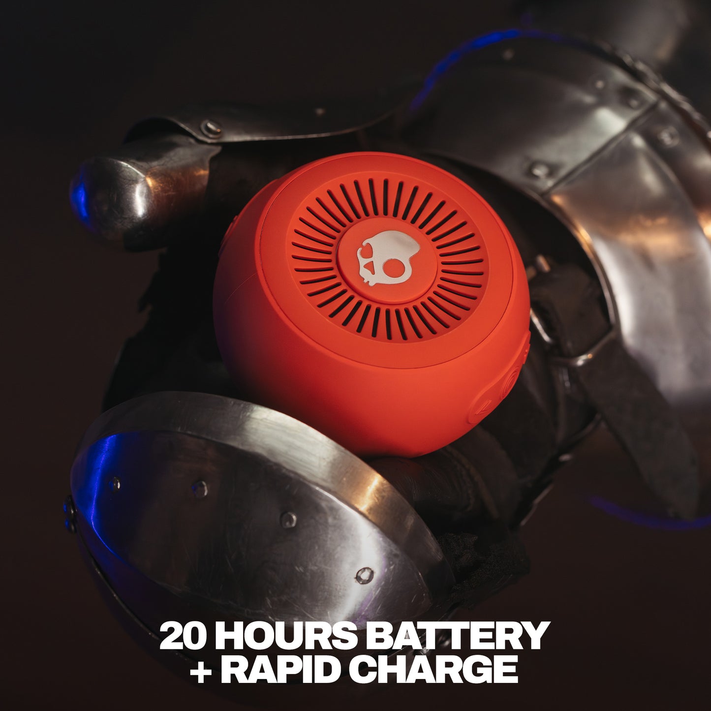 Red portable speaker with a brand logo on a dark background, featuring text about battery life and charging speed. | Plasma
