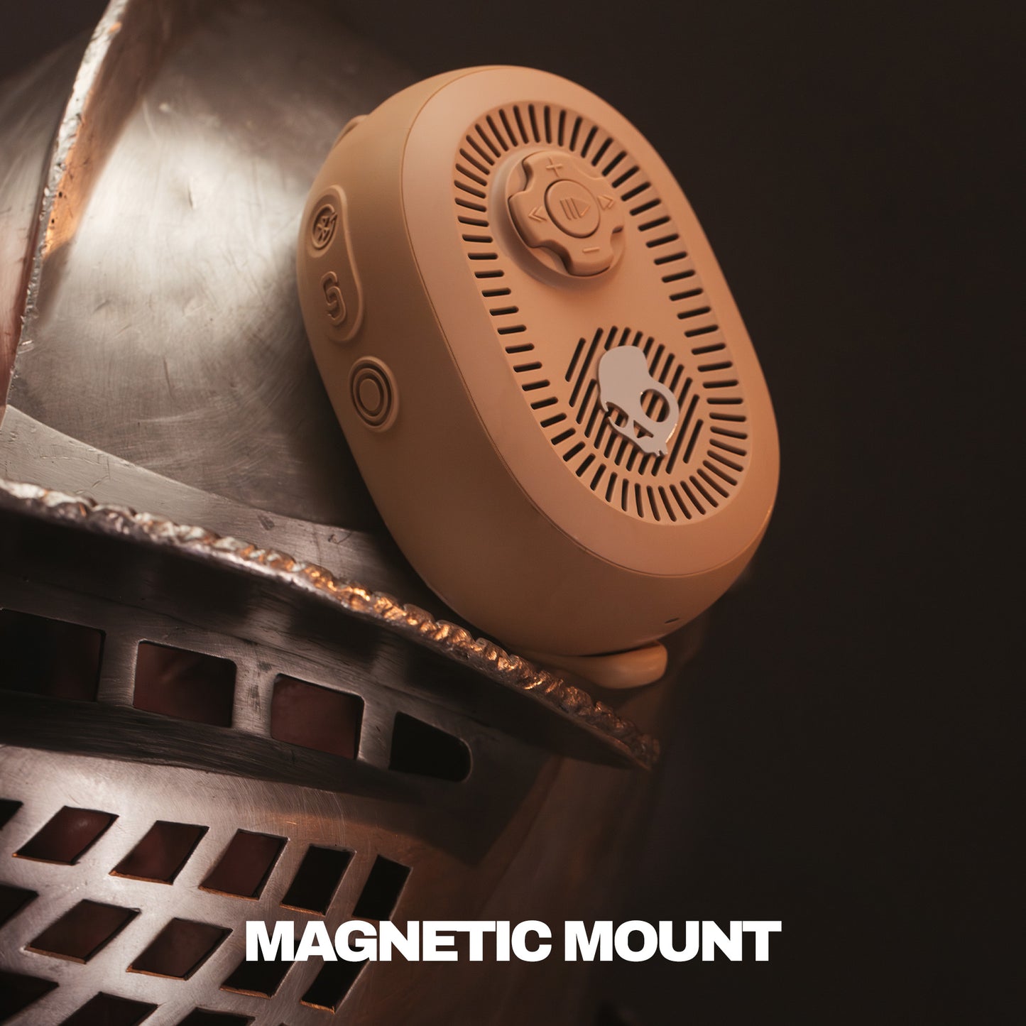 Brown magnetic speaker on a metallic surface with 'MAGNETIC MOUNT' text. | Primer