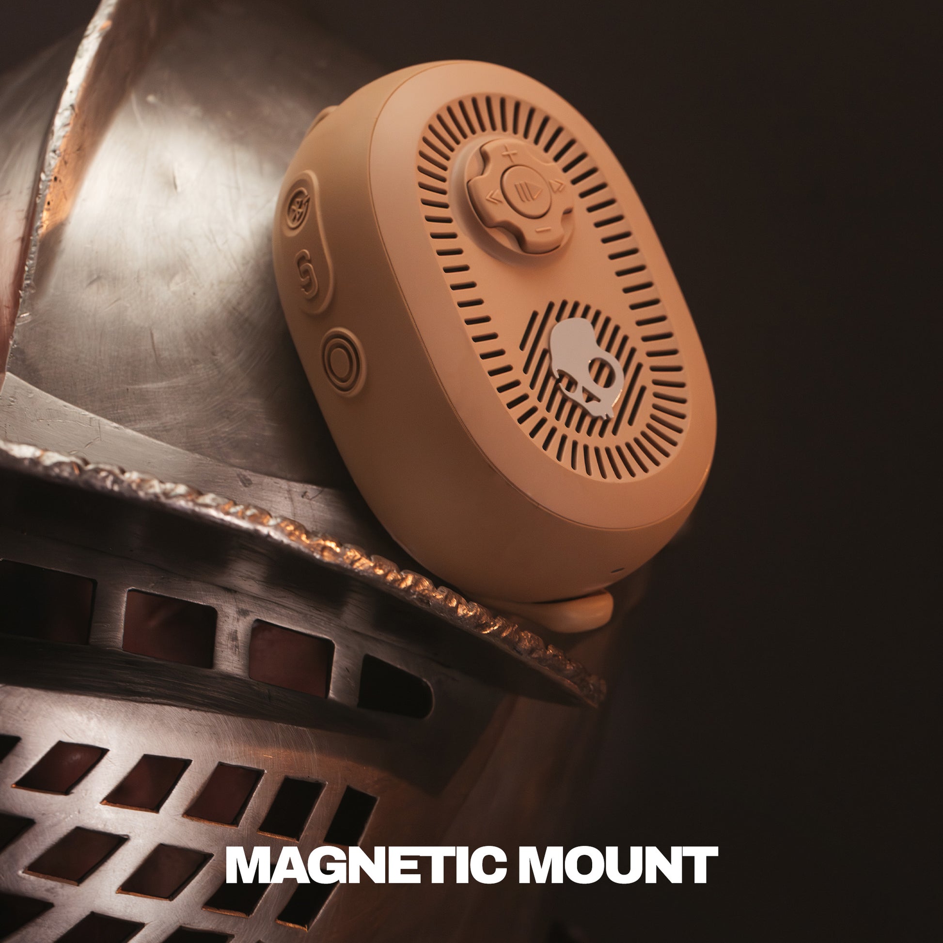 Brown magnetic speaker on a metallic surface with 'MAGNETIC MOUNT' text. | Primer