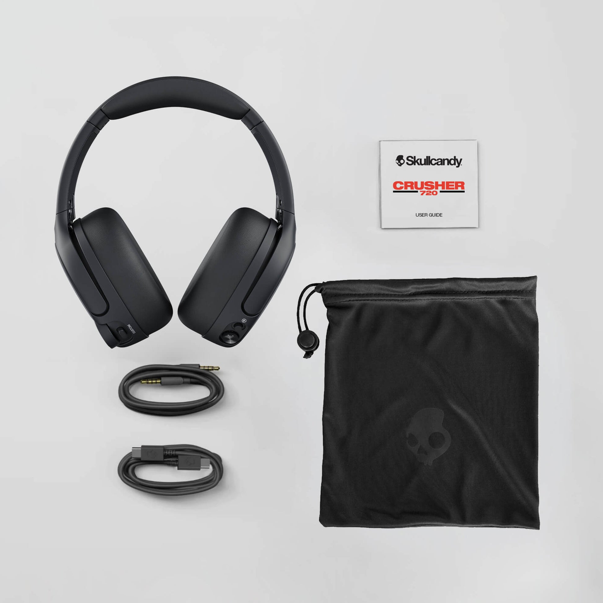 Skullcandy Crusher 720 headphones with accessories on a light gray background | Future